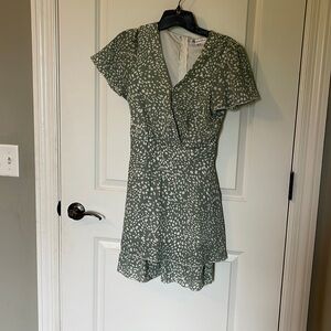 Adorable tiered skirt dress with tie back and wrap front